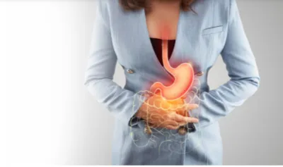Mulher segurando a barriga e ícone de intestino
